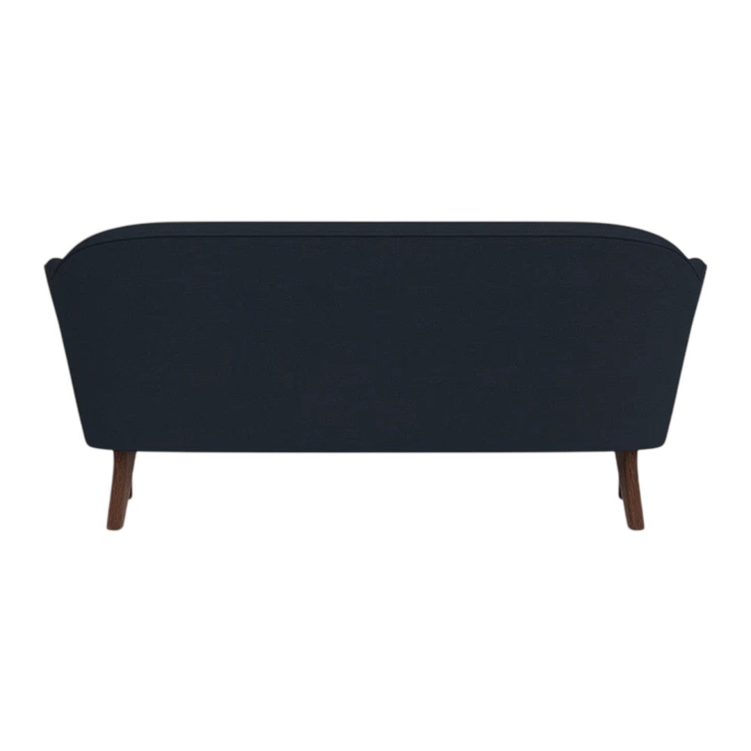 Navy blue sofa with a sleek, modern design and wooden legs, featuring a smooth, solid fabric pattern.