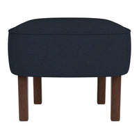 Navy blue upholstered ottoman with sleek edges and natural wood legs, featuring a minimalist design.
