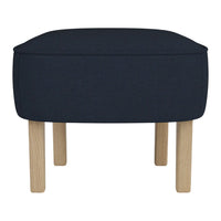 Dark blue upholstered ottoman with light wood legs, featuring a sleek, minimalist design. Perfect for modern decor.