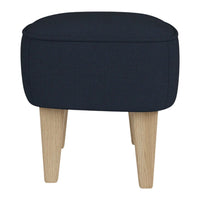 Navy blue upholstered ottoman with a simple, solid pattern and light wooden legs. Perfect for modern decor.