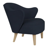 Navy blue accent chair with a smooth, curved silhouette and natural wood legs, perfect for modern décor.