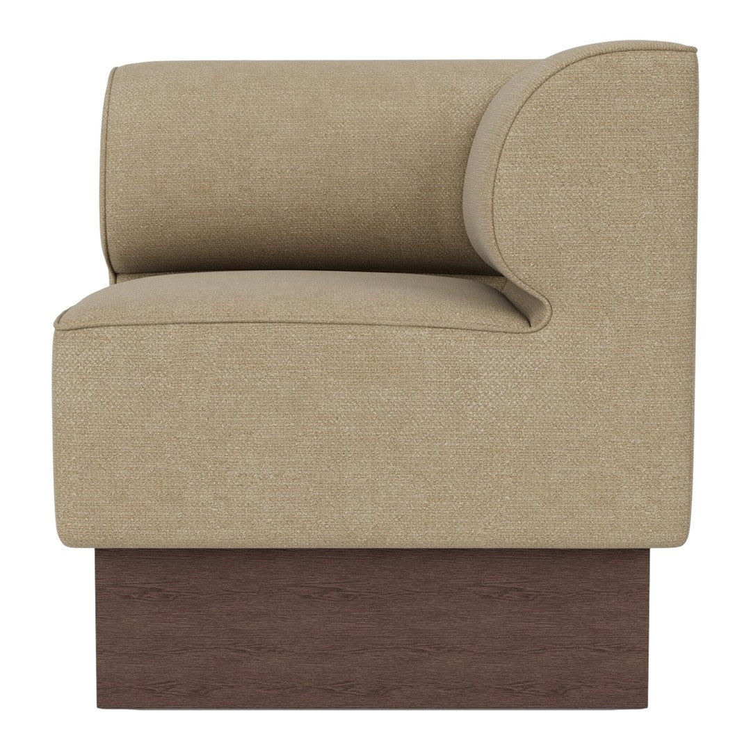Beige upholstery with a subtle texture, complemented by a dark wooden base. Modern and stylish corner accent chair.