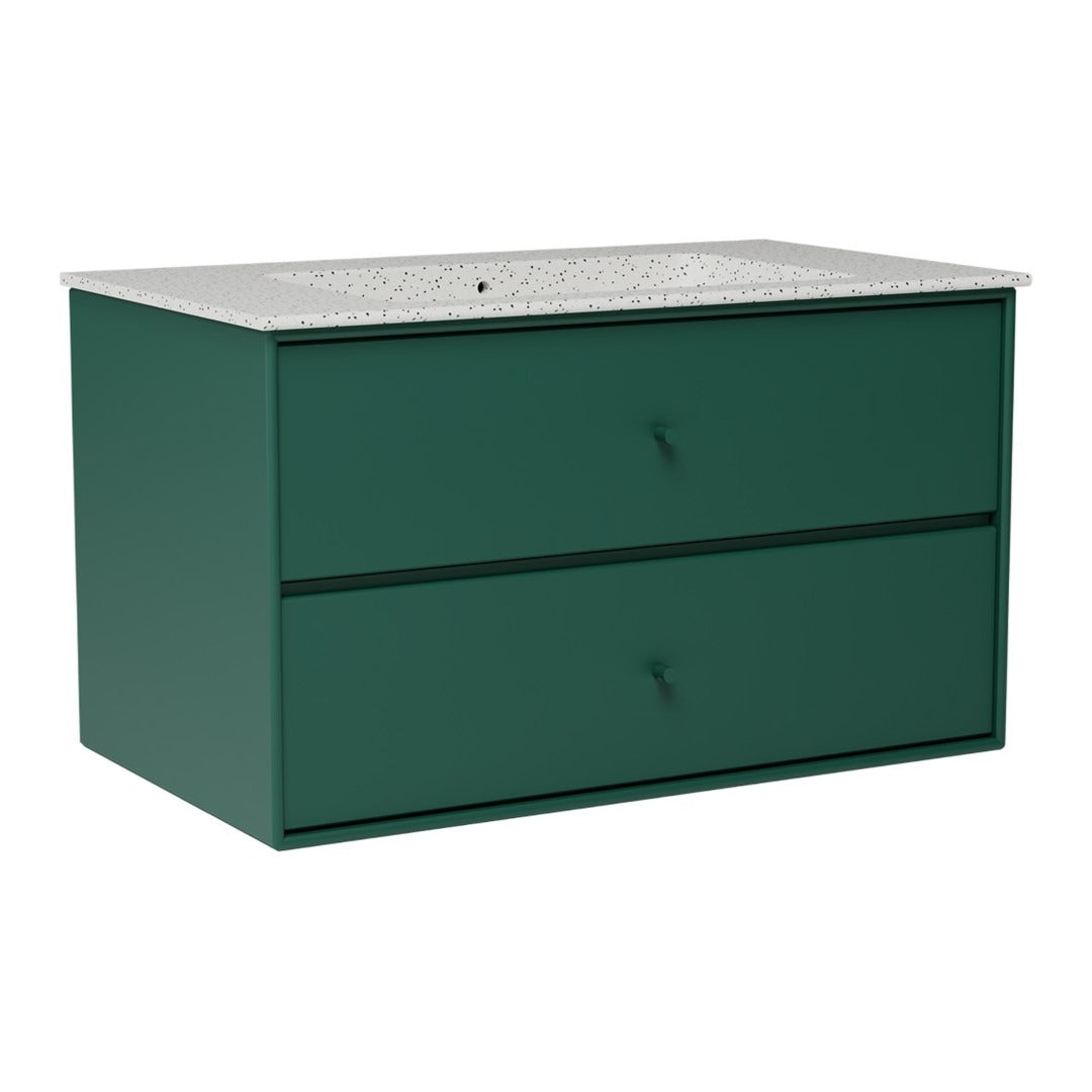 Green two-drawer cabinet with a speckled gray countertop for a modern, stylish accent.