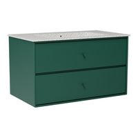 Green two-drawer cabinet with a speckled gray countertop for a modern, stylish accent.