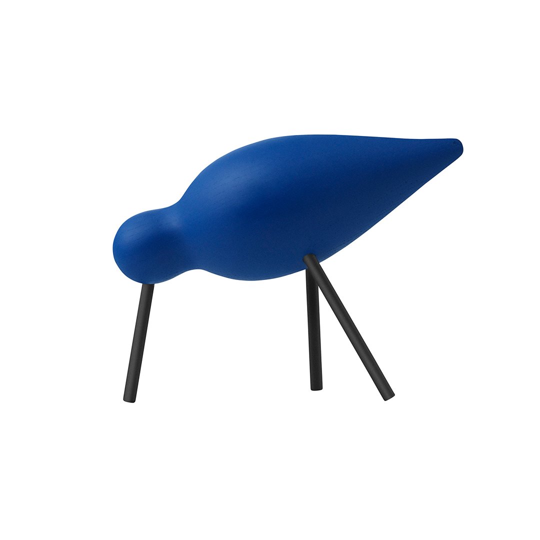 Blue decorative bird sculpture with a smooth finish and black legs, adding a modern touch to any space.