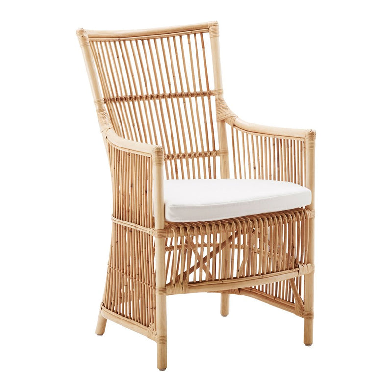 Natural bamboo chair with a white cushion, featuring a sleek, woven pattern and a minimalist design.
