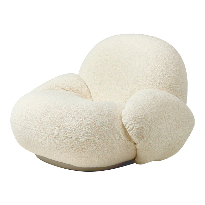 Soft cream-colored chair with a plush, textured surface and rounded, inviting shapes. Perfect for cozy interiors.