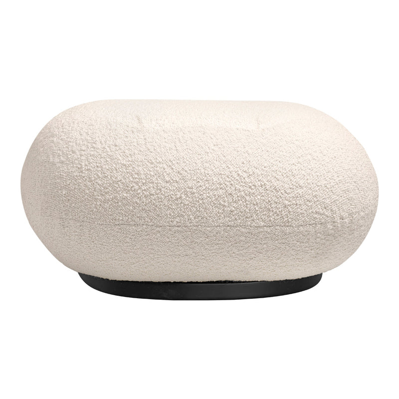"Textured ivory pouf with a rounded shape and a sleek black base."