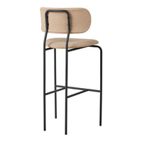 Beige fabric bar stool with a black metal frame, featuring a simple, modern design and clean lines.