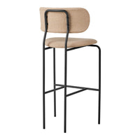 Beige fabric bar stool with a black metal frame, featuring a simple, modern design and clean lines.