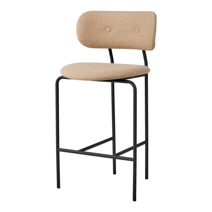 Beige upholstered bar stool with black metal frame and simple, modern design. Ideal for contemporary spaces.