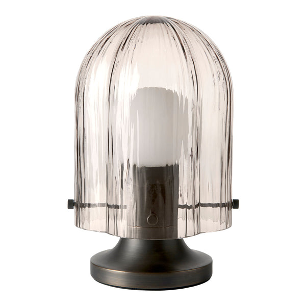 Smoky grey glass lamp with ribbed texture, featuring a black metal base for a modern look.