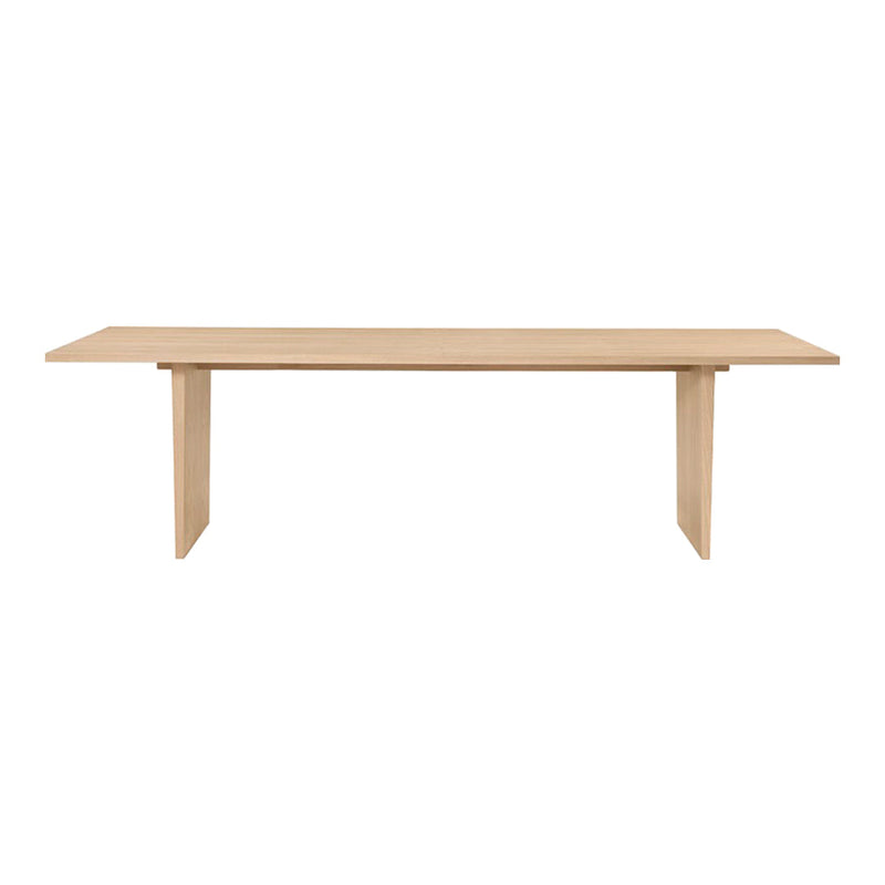 Light wood dining table with a smooth, natural finish and minimalist design, perfect for modern interiors.