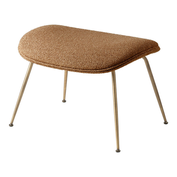 Brown textured upholstery ottoman with curved shape and sleek metal legs. Perfect for modern decor.