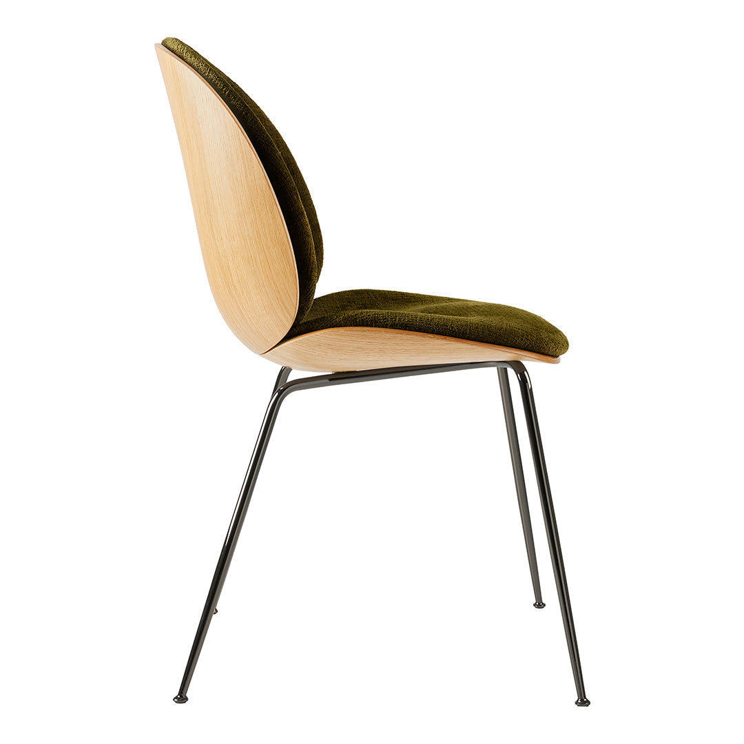 Stylish chair featuring a rich olive green velvet seat and natural wood finish with sleek black metal legs.