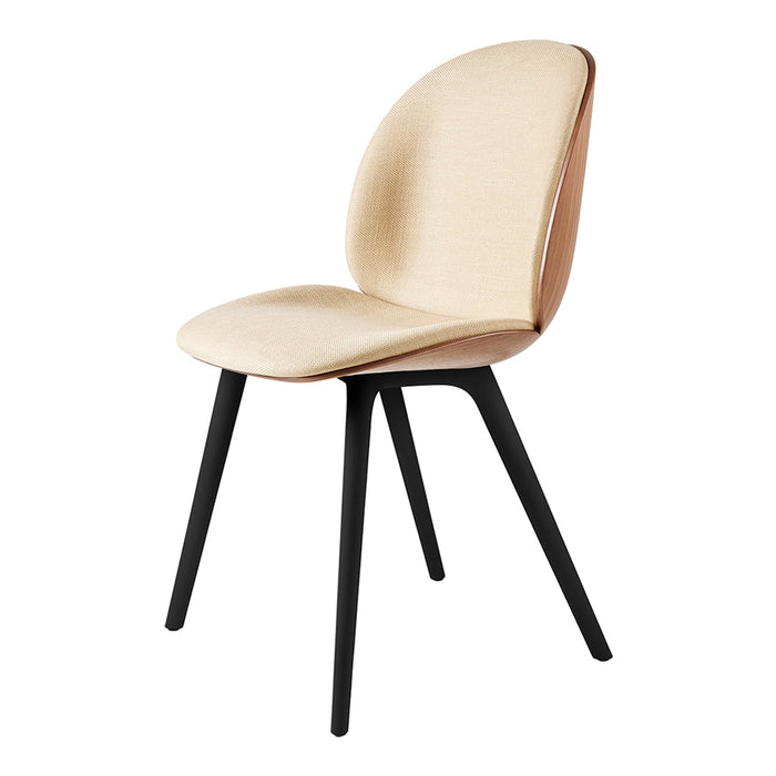 Beige upholstered chair with a smooth, minimalist design and sleek black legs. Perfect for modern decor.
