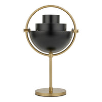 Black and gold table lamp with a sleek, modern design and geometric patterns. Perfect for contemporary decor.
