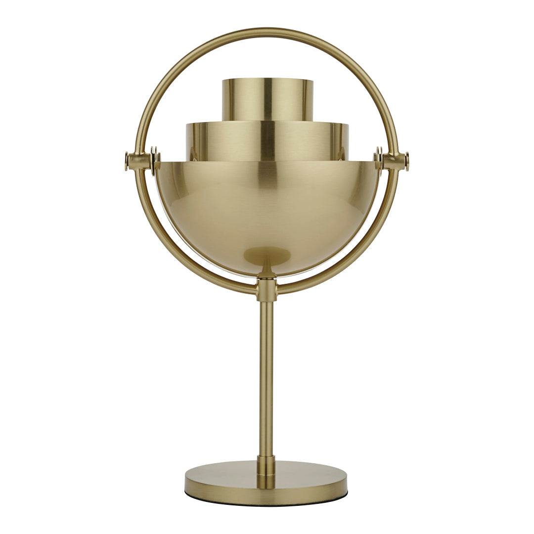 Brass table lamp with sleek, modern design featuring rounded shapes and a polished metallic finish.