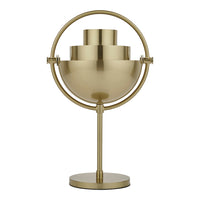 Brass table lamp with sleek, modern design featuring rounded shapes and a polished metallic finish.