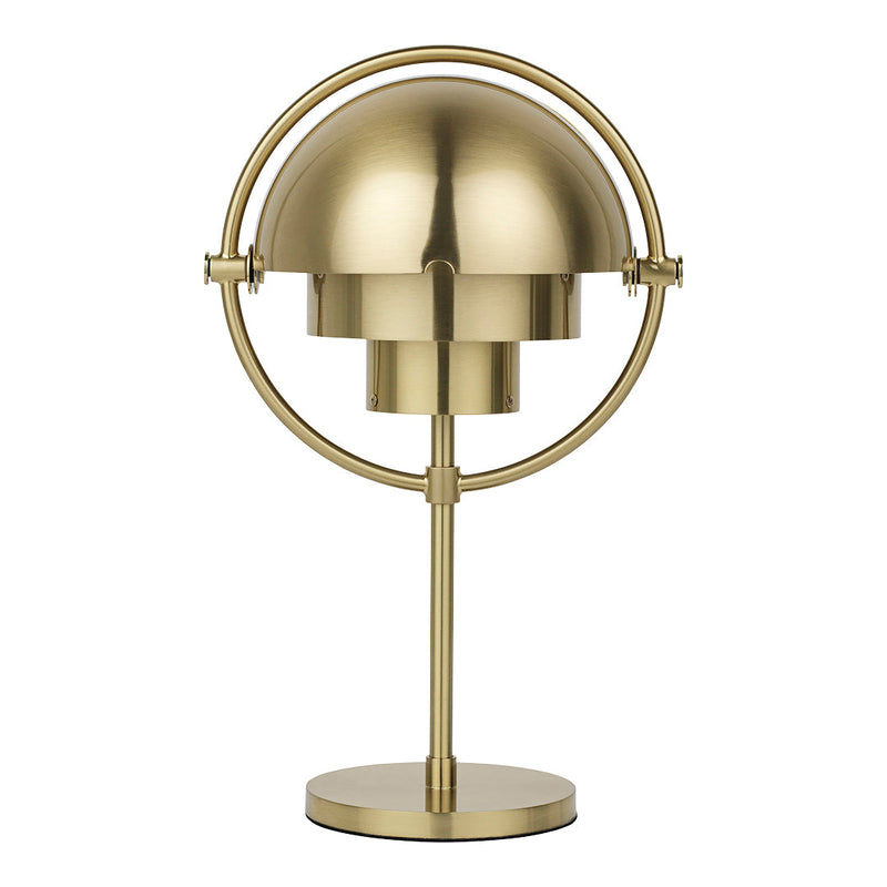 Brass desk lamp with a sleek, modern design featuring a circular base and a symmetrical dome shade.