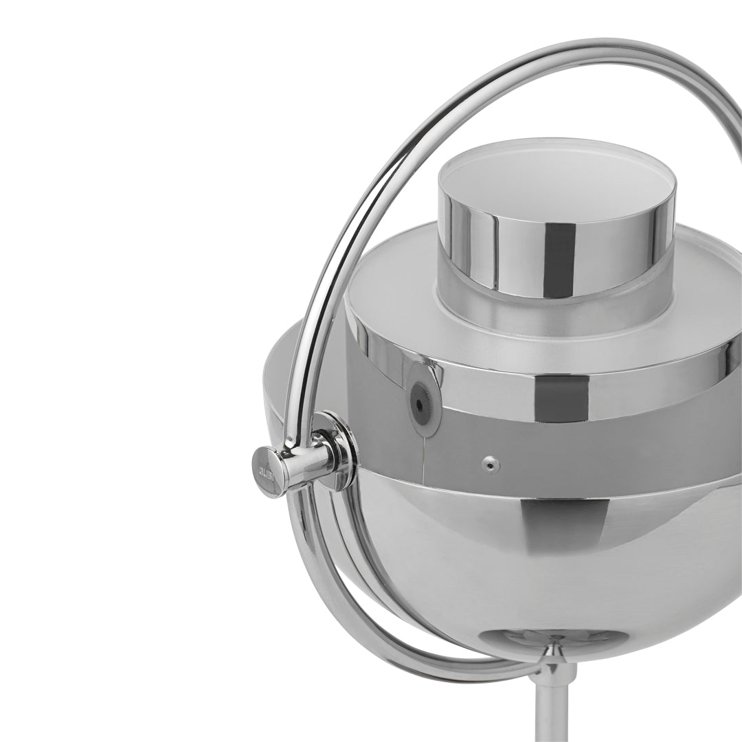 Polished silver kettle with sleek curves and modern design, featuring a shiny metallic finish and minimalist detailing.