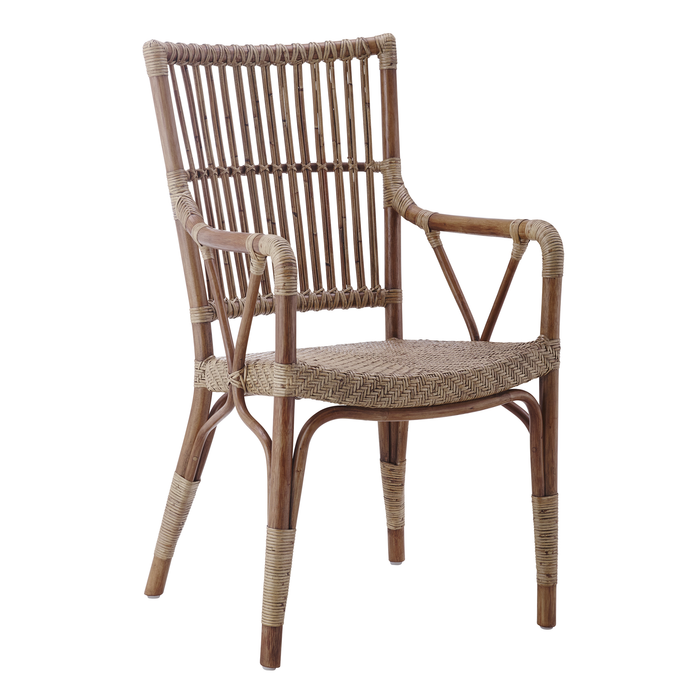 Natural rattan chair with a woven pattern and light brown tones, offering a rustic, bohemian style.