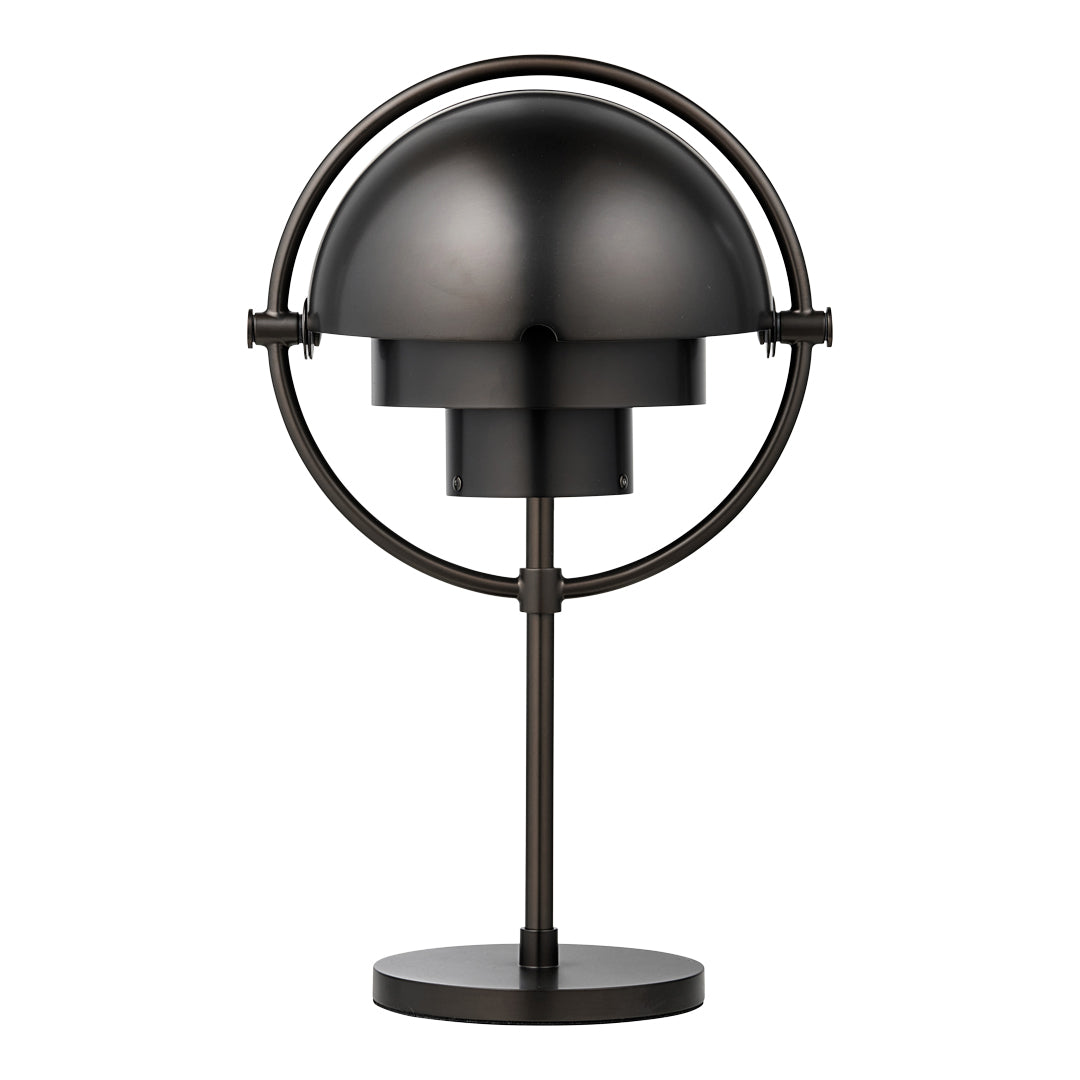 Black metal table lamp with a sleek dome shape and circular support, featuring a modern, minimalist design.