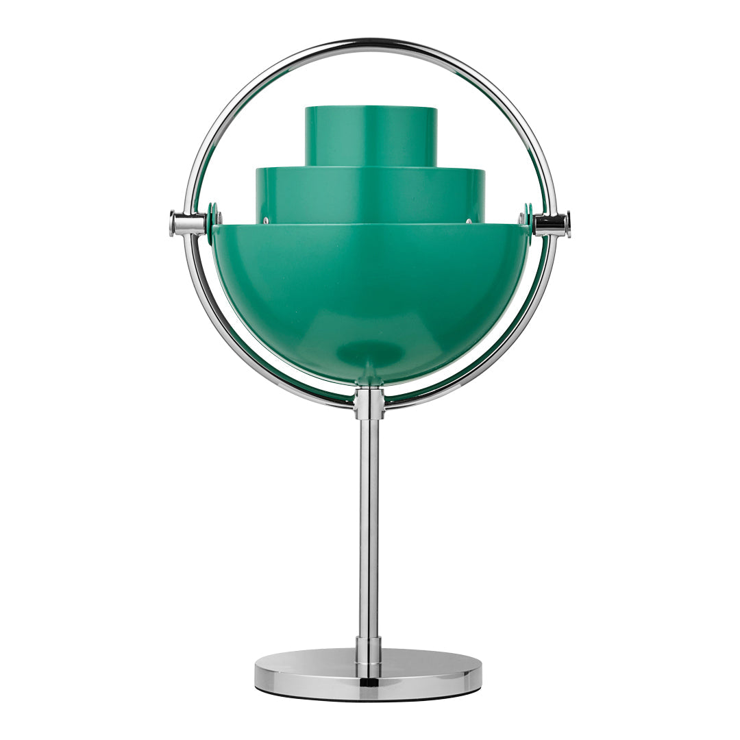 Modern teal lamp with circular chrome stand and layered geometric design. Perfect for contemporary decor.