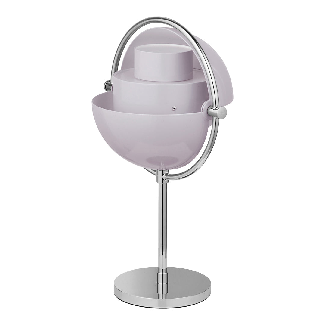 Modern lamp in soft lavender with sleek chrome accents and a minimalist spherical design. Perfect for contemporary decor.
