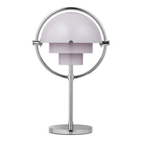 Sleek silver table lamp with a frosted lavender dome shade and minimalist circular base design.