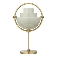 Gold table lamp with a layered, white glass design and circular base, featuring clean lines and modern aesthetic.