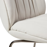 Beige upholstered chair with textured ribbed pattern and sleek chrome base. Ideal for modern decor.