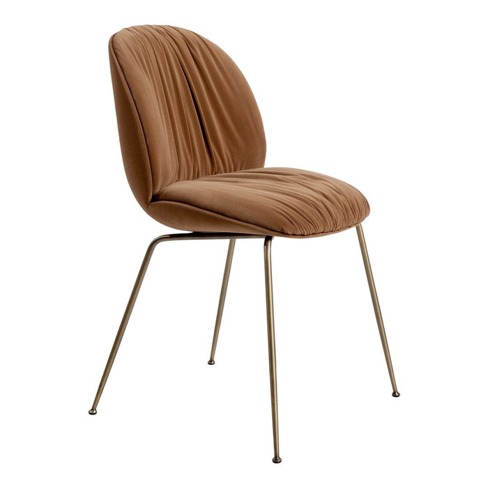 "Cozy brown upholstered chair with elegant pleated pattern and sleek metal legs, ideal for modern decor."