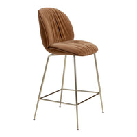 Brown upholstered bar stool with pleated texture and sleek gold metal legs. Ideal for modern decor.