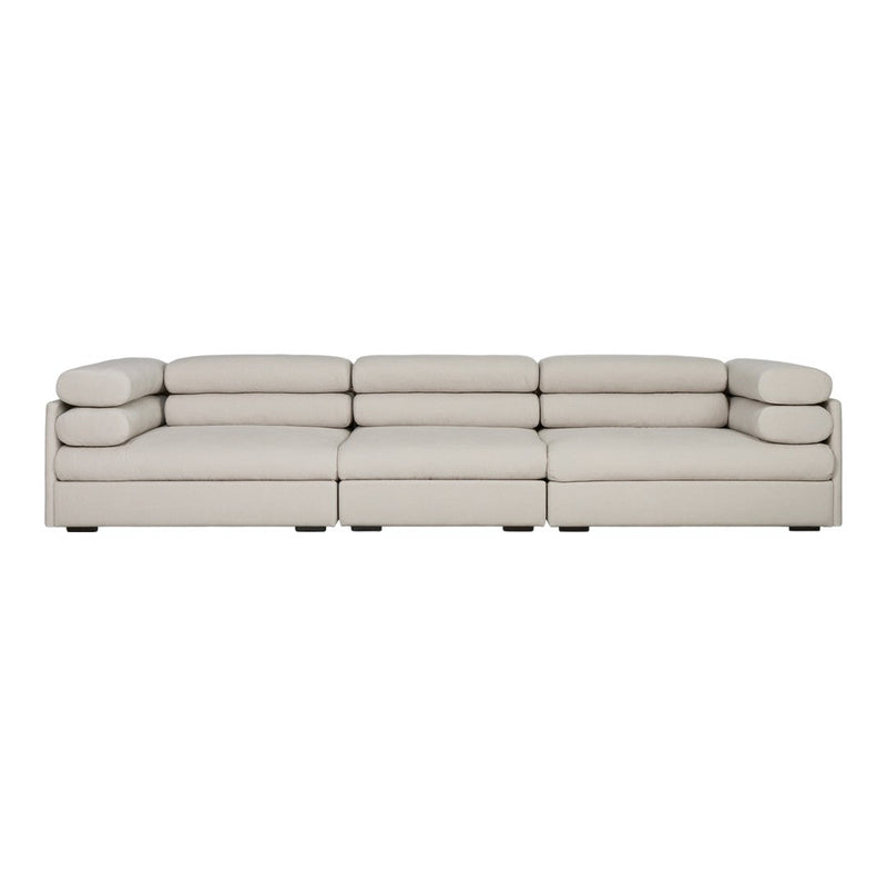 Elegant light beige sectional sofa with smooth, minimalist design and plush cushions for a modern living space.