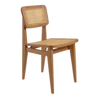 Natural wood chair with a light oak finish and woven cane seat, showcasing a minimalist and rustic design.