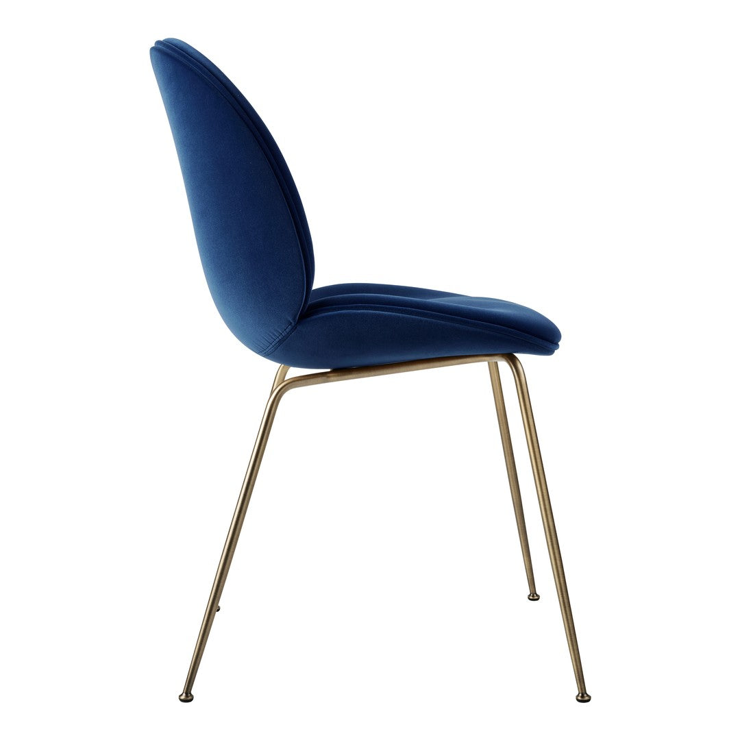 Blue velvet chair with a sleek, modern design and gold metal legs. Perfect for stylish home decor.