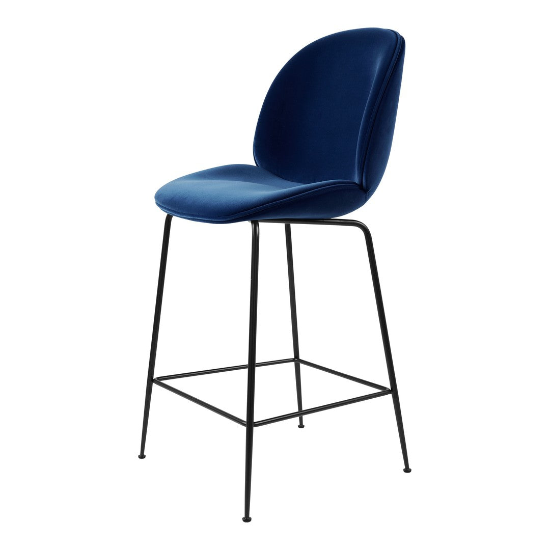 Blue velvet bar stool with a sleek black metal frame, featuring a smooth, modern design. Perfect for contemporary decor.