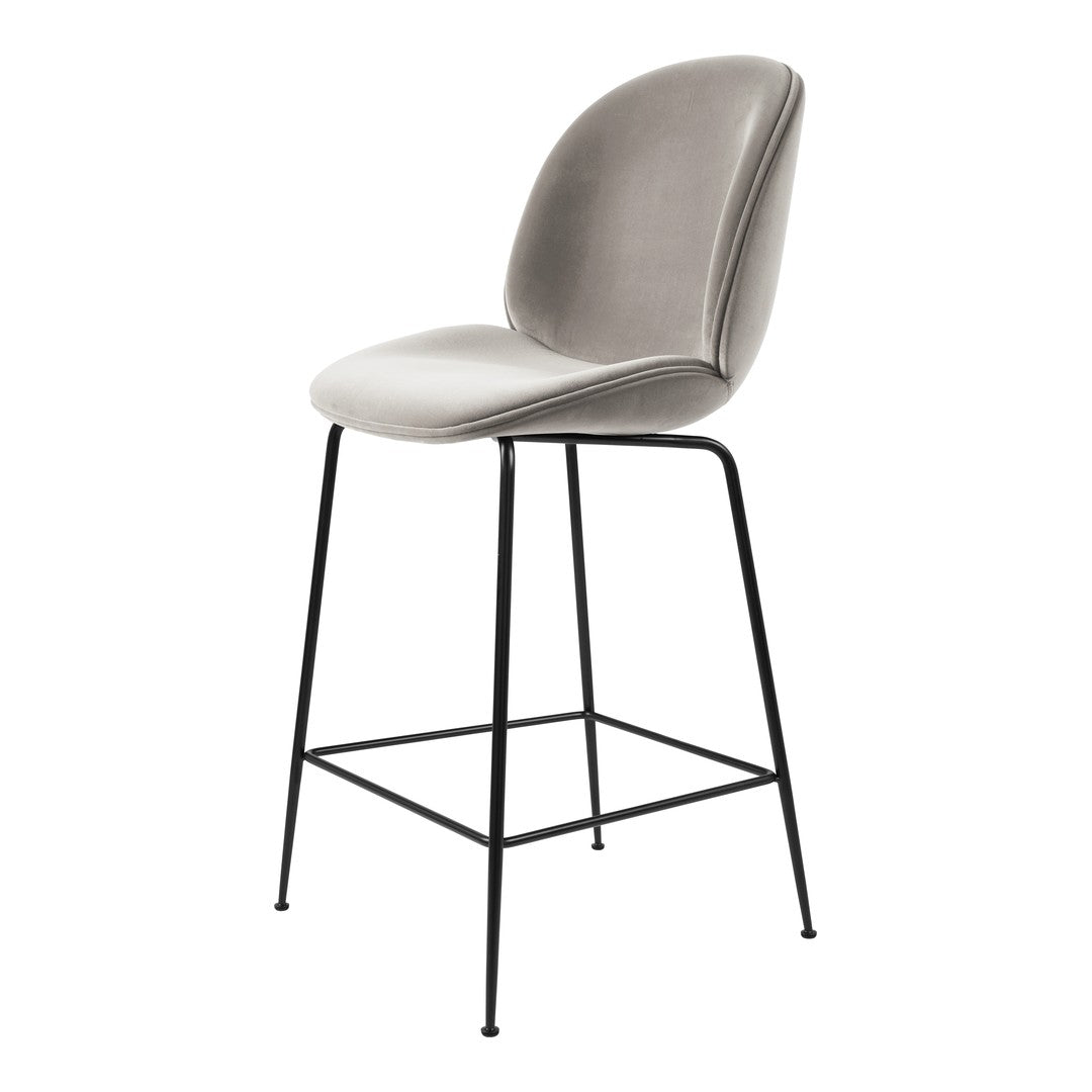 "Light gray upholstered bar stool with smooth curves and a minimalist black metal frame."