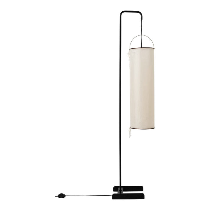 Minimalist black metal floor lamp with a cylindrical beige fabric shade, lending a modern touch to any space.
