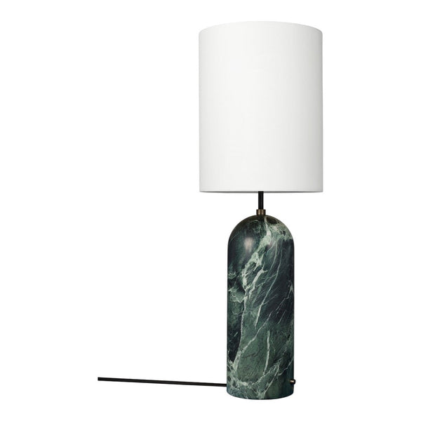 Marble lamp base in deep green with white cylindrical shade; modern design with elegant color contrast.