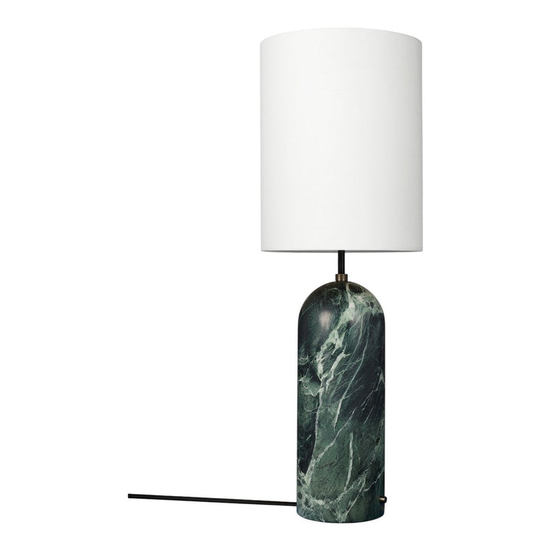 Marble lamp base in deep green with white cylindrical shade; modern design with elegant color contrast.