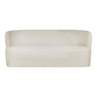 Stylish cream-colored sofa with a smooth, textured surface and minimalist design. Perfect for modern interiors.