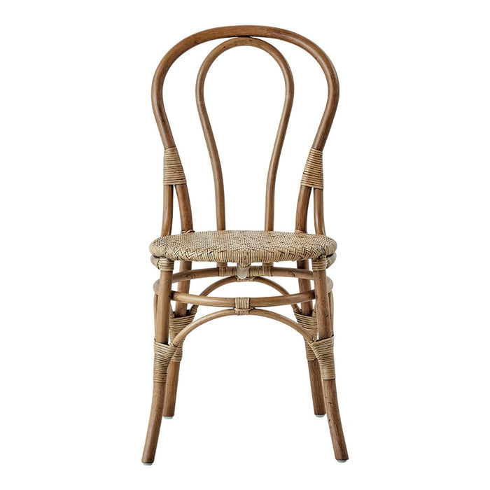 Natural rattan chair with woven seat, featuring classic bentwood design and earthy tones. Perfect for rustic decor.