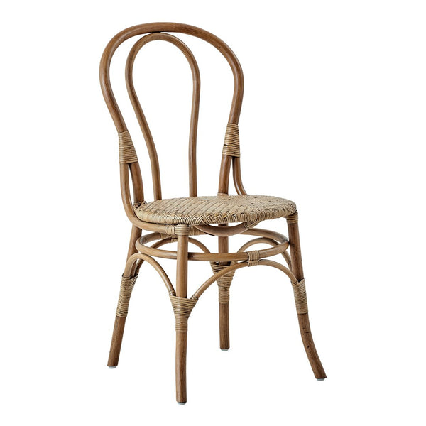 Natural rattan chair featuring a woven seat and curved backrest, showcasing a light, neutral color palette.