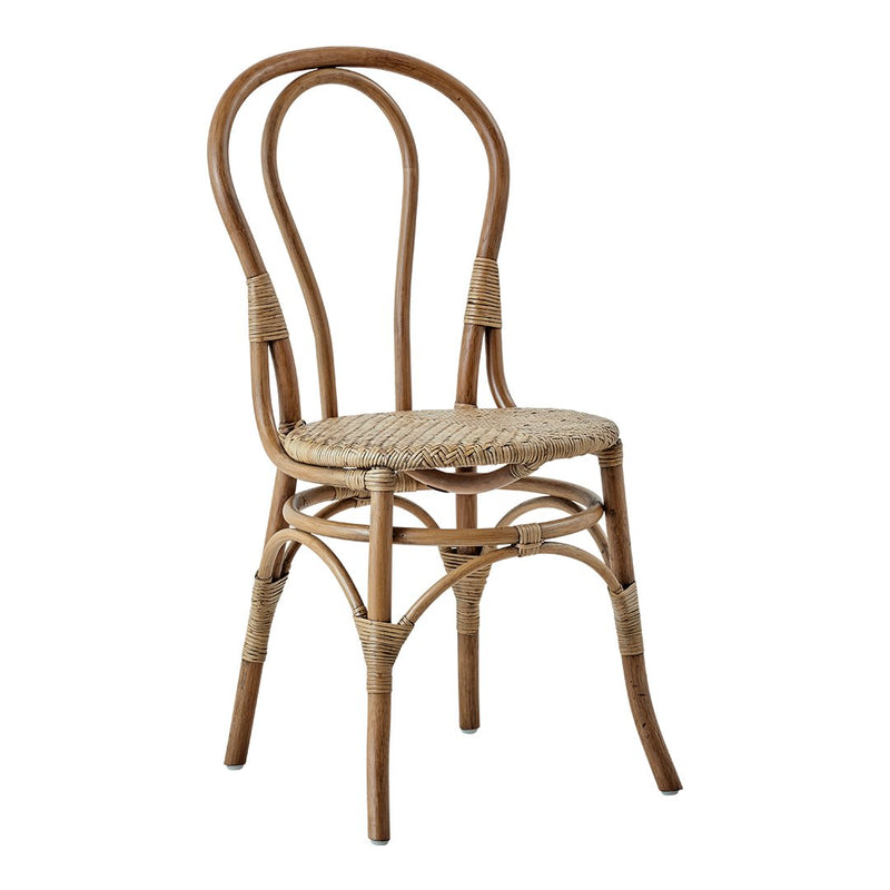 Natural rattan chair featuring a woven seat and curved backrest, showcasing a light, neutral color palette.