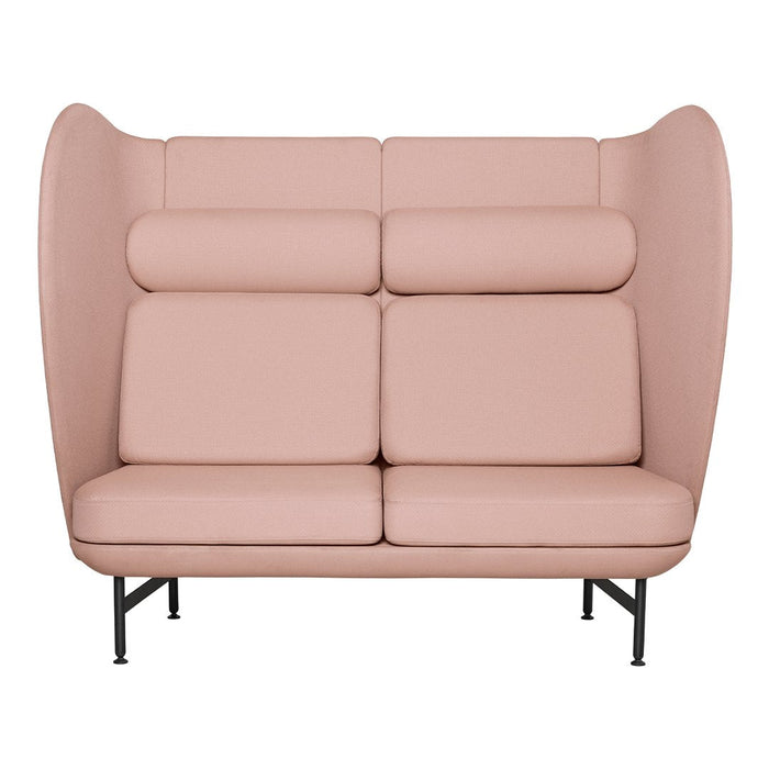 Light pink, smooth upholstery with a modern, minimalist design and bold curved backrest pattern.