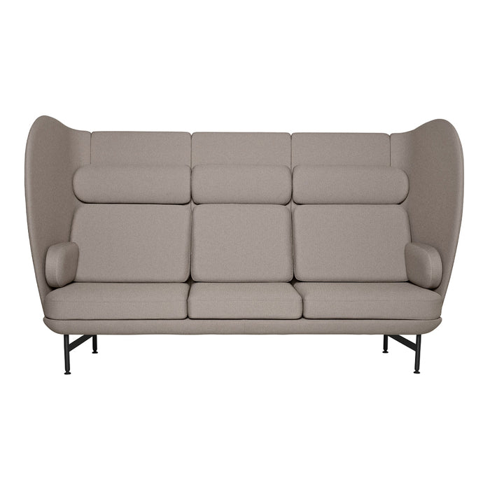 Modern beige high-back sofa with soft upholstery and sleek black metal legs, featuring a clean, minimalist design.
