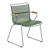 Green striped chair with wooden armrests and a sleek metal frame. Modern design with a versatile color palette.