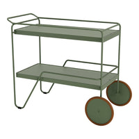 Green metal serving cart with two shelves and brown circular wheels, showcasing a sleek, modern design.